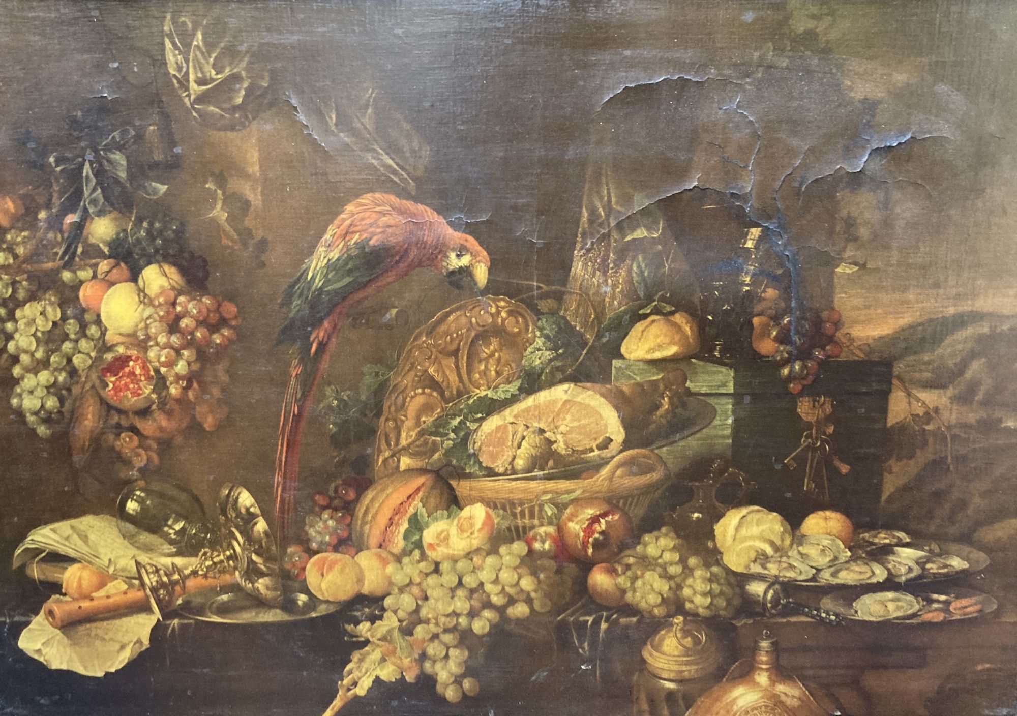 After De Heem (1600-1671), colour print, Still life (a.f.), housed in an ornate gilt gesso frame, aperture 65 x 96cm